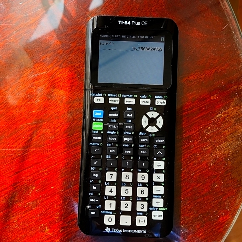 TI-84 Plus CE Graphing Calculator with Manual